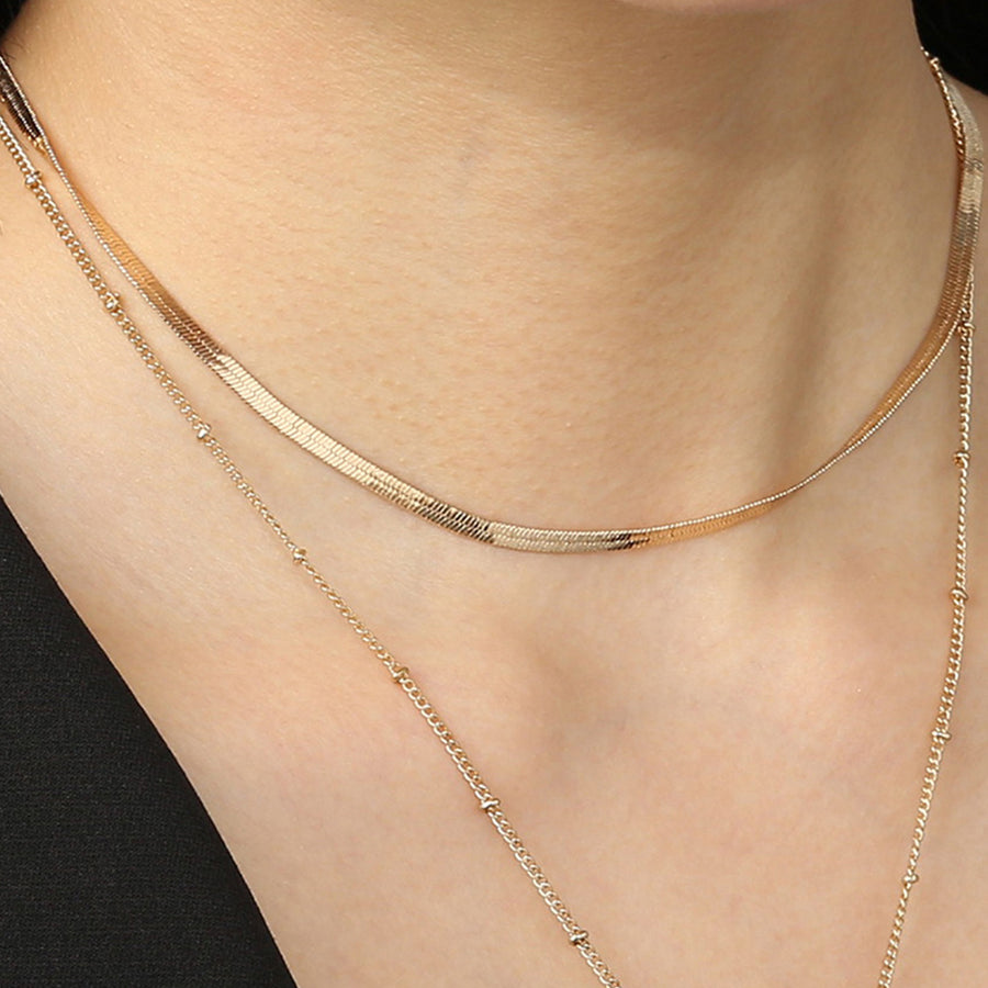 gold flat snake mid-layer chain necklace